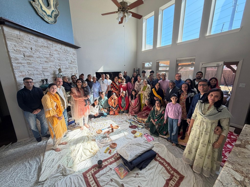 Families and elders gathered for the monthly HARIT havan